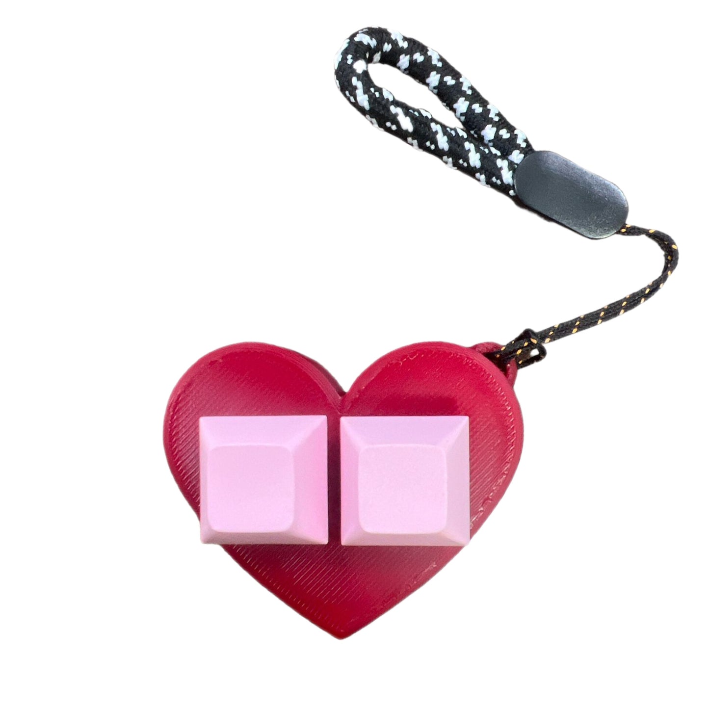 It's a 3D heart-shaped finger fidget. With keyboard keys to keep your fingers busy and it is on a keychain and it's red with pink keys