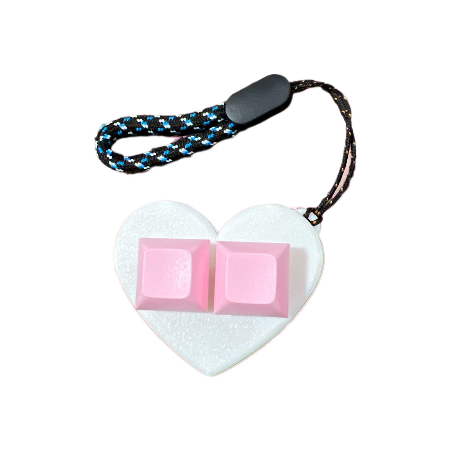 It's a 3D heart-shaped finger fidget. With keyboard keys to keep your fingers busy and it is on a keychain and it's white with pink keys.