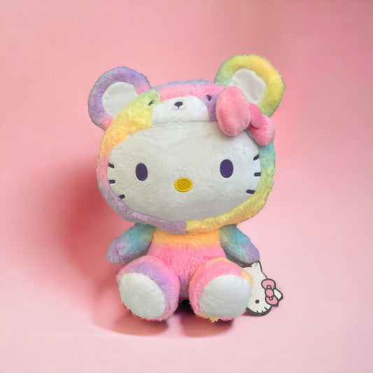 Hello Kitty by Sanrio is wearing a rainbow teddy bear onesie. It is soft like a plushie and pillow. Is 18 inches tall and it's very cute and Kawaii.
